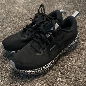 Revel 6 Brooks Black Sneakers with Animal Print Sole